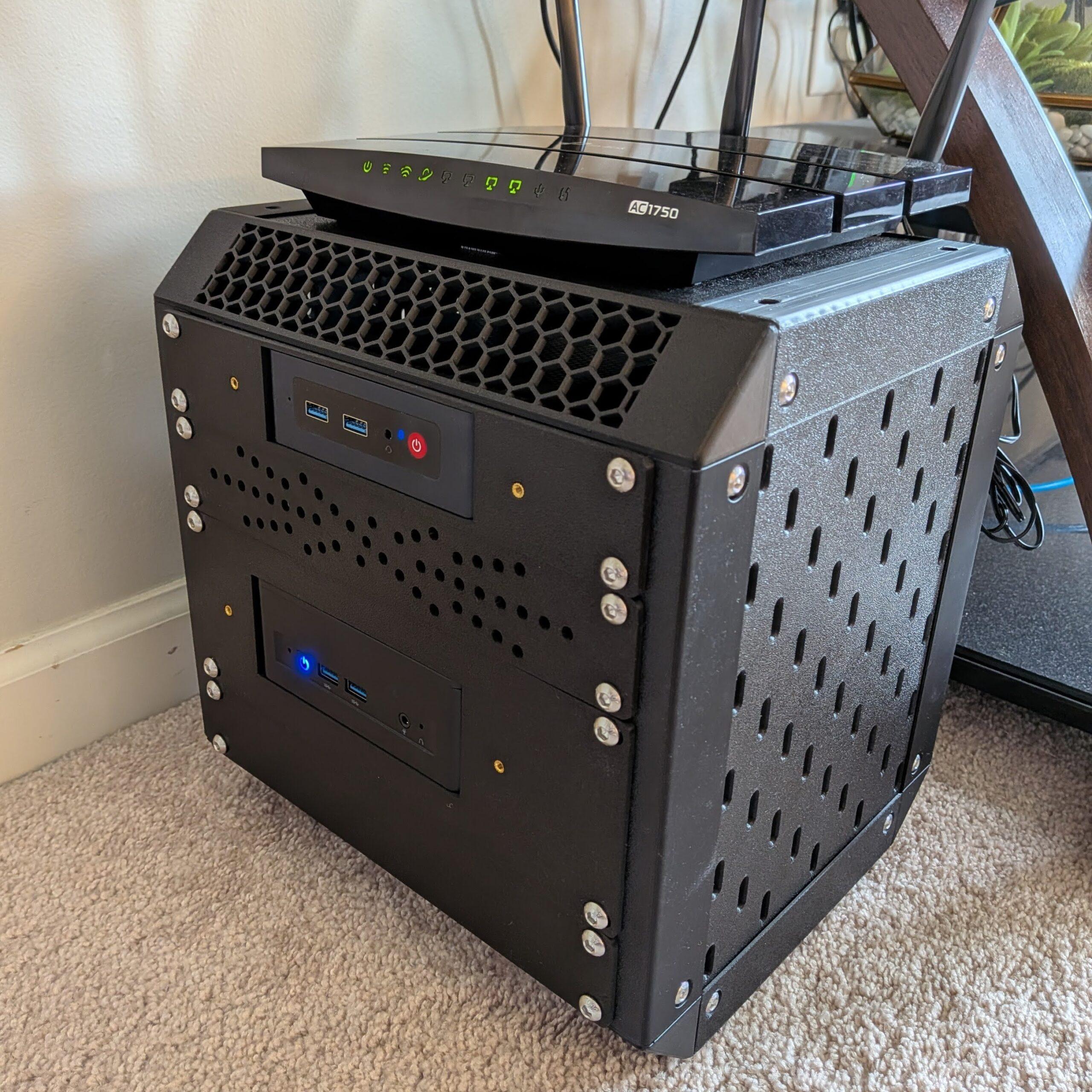 3D printed server rack holding the mini PC that runs RookiDroid